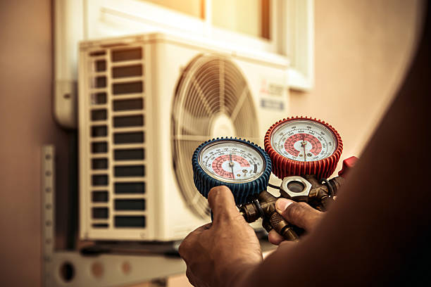 Professional Heat Pump Repair technician working in West Harwich, MA